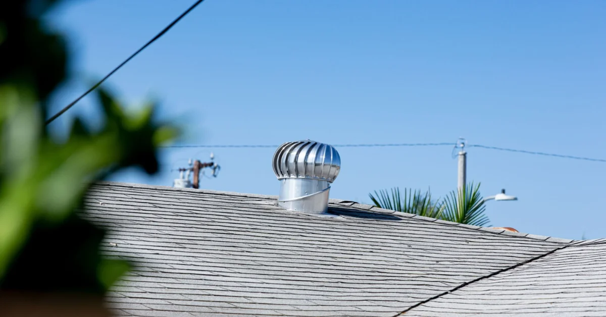 whirlybird installed on tiled roof in suburban Melbourne setting (1)